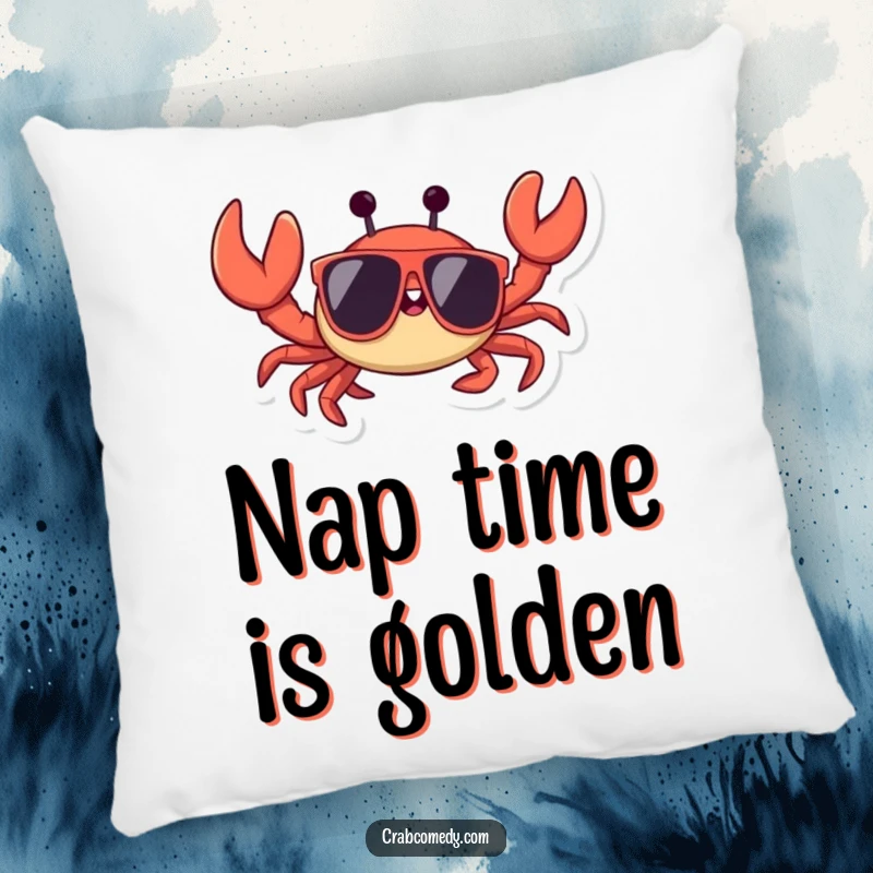 Funny, scuttling crab wearing big sunglasses, waving a claw, on a soft decorative pillow.